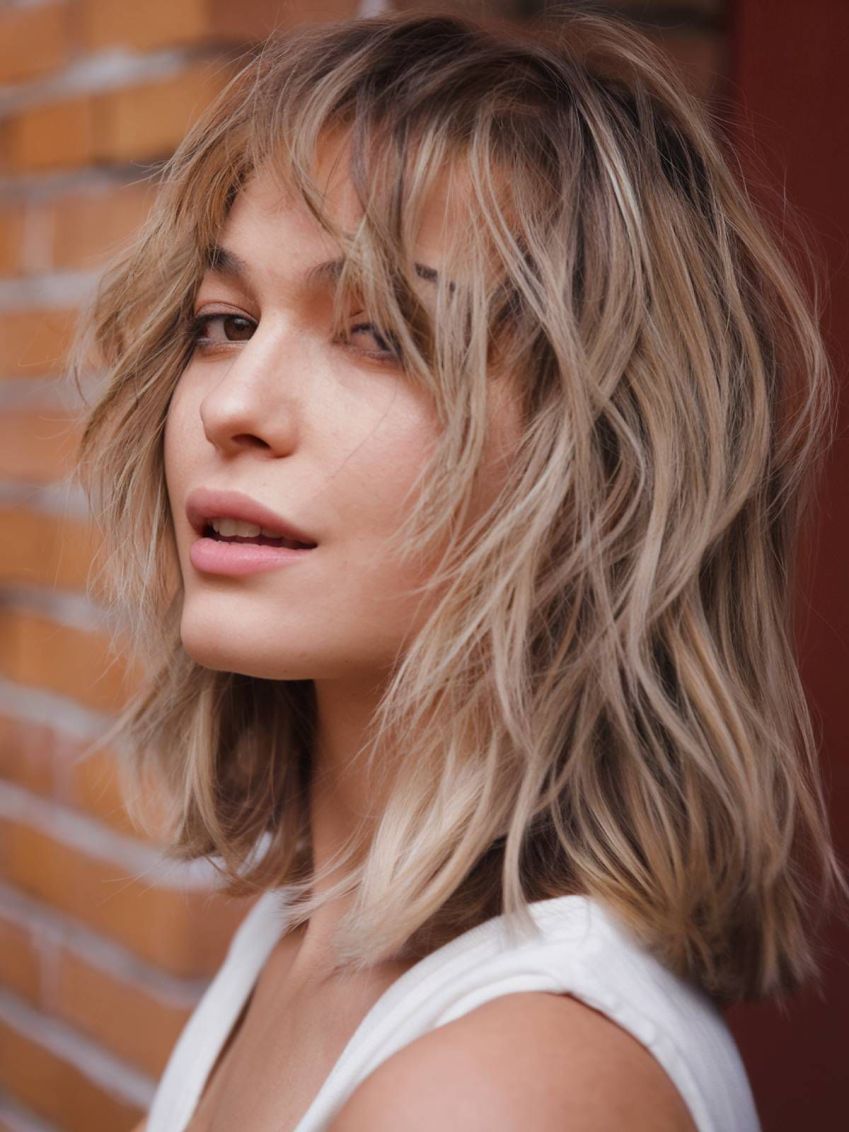 melhores cortes de cabelo médio para rosto redondo 2026