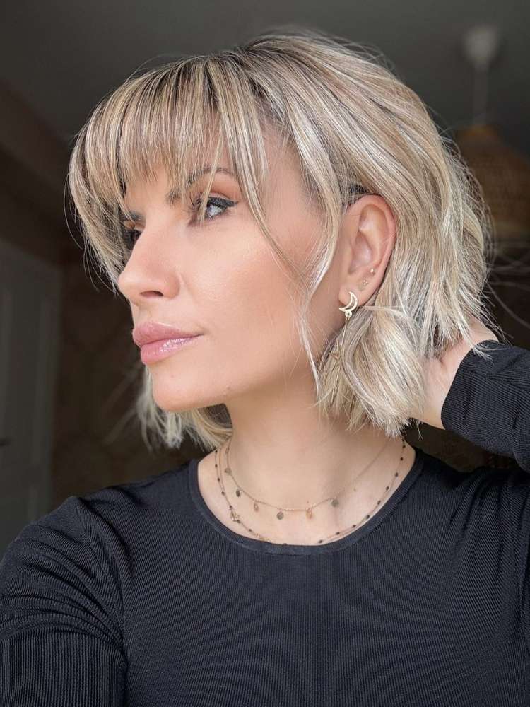 franja lateral para rosto redondo mulheres 50 anos