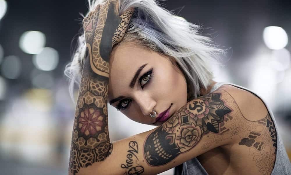 ideias de tatuagens femininas delicadas para o braço