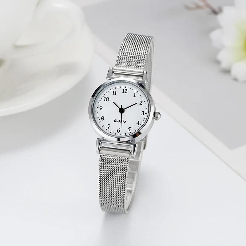 Relógio feminino prata com mostrador sunray
