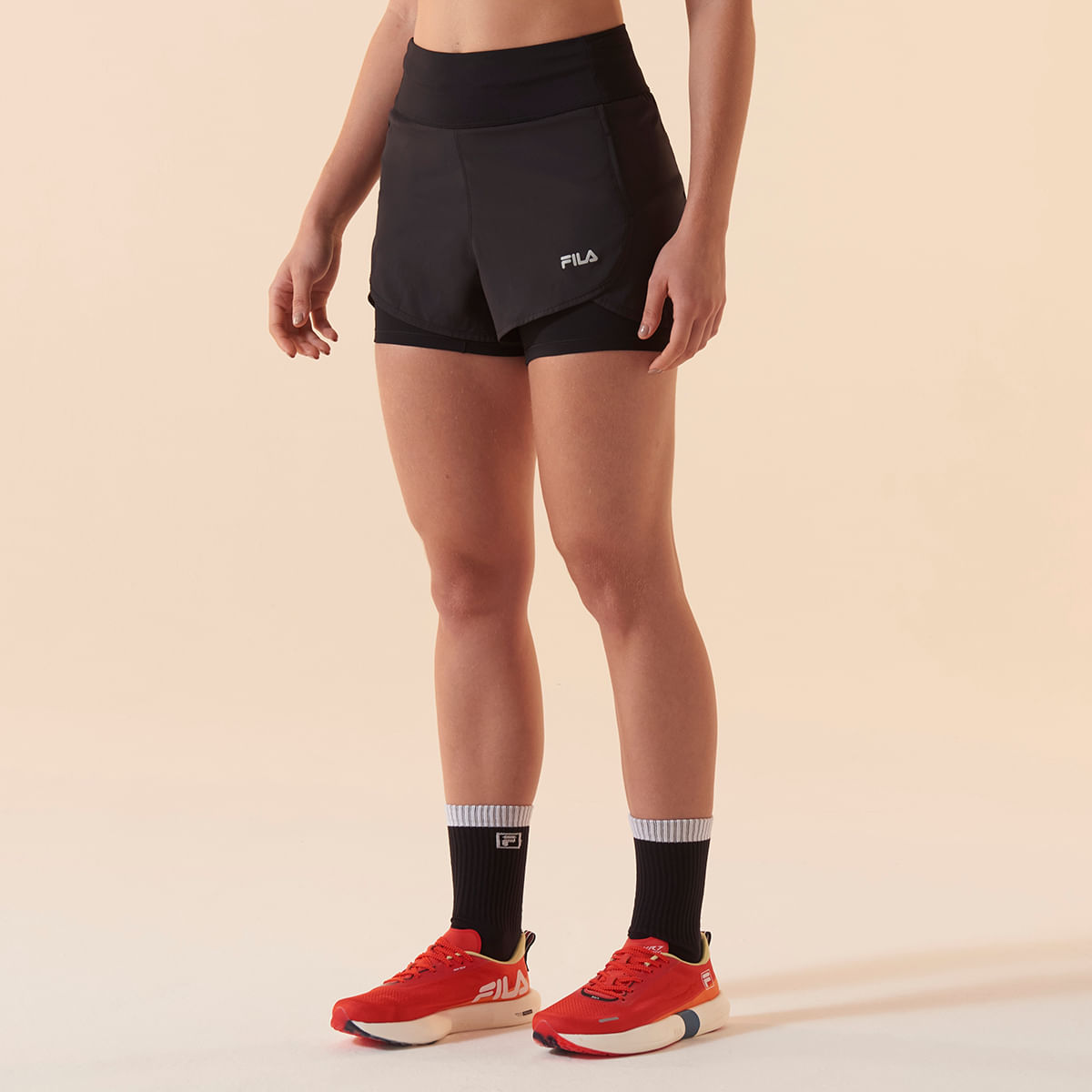 Shorts de compressão com bolsos