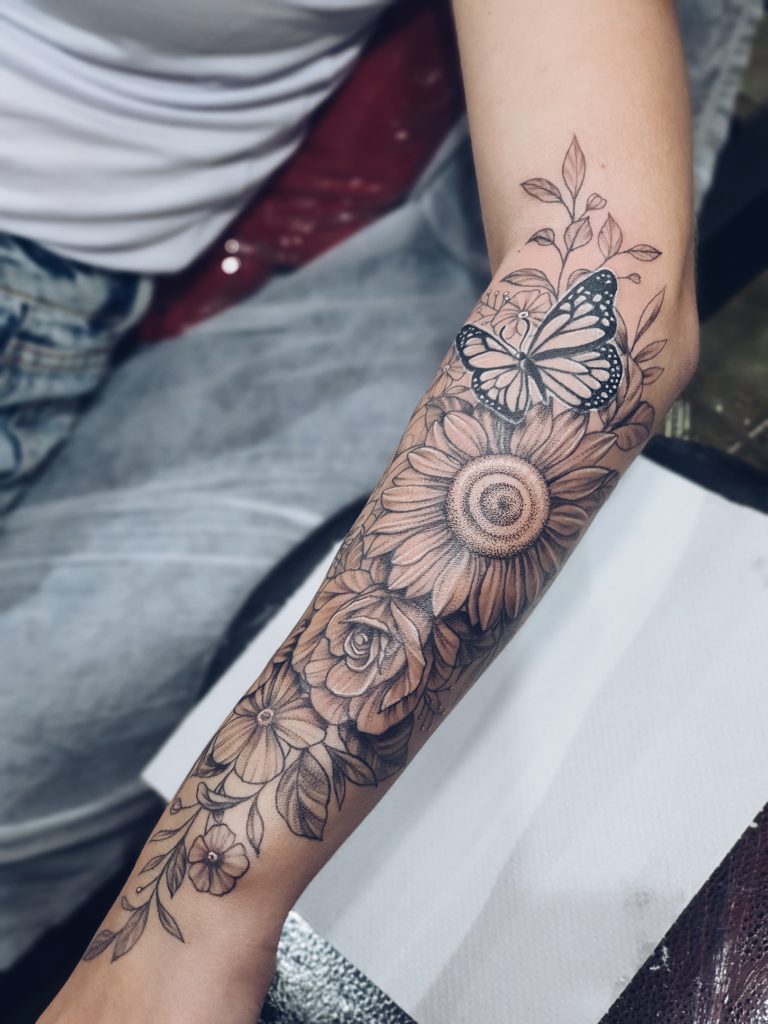 ideias de tatuagem braço feminino delicada