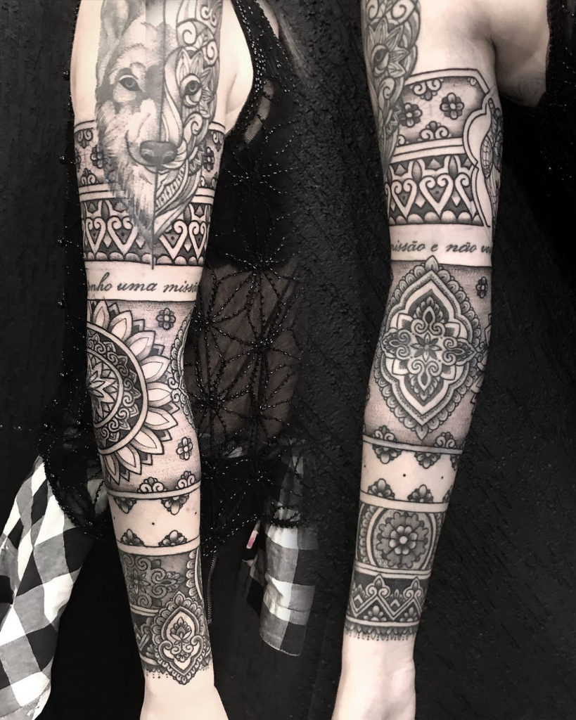 tatuagem feminina braço fechado