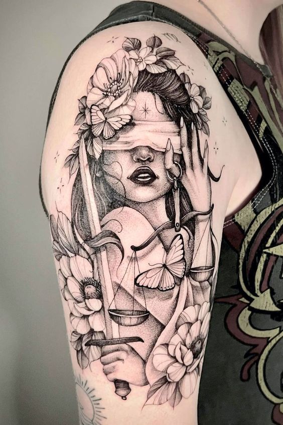 tatuagem feminina concha braço
