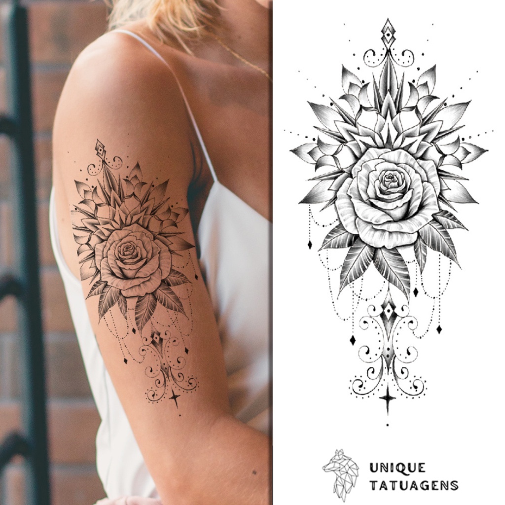 tatuagem feminina braço preto e cinza