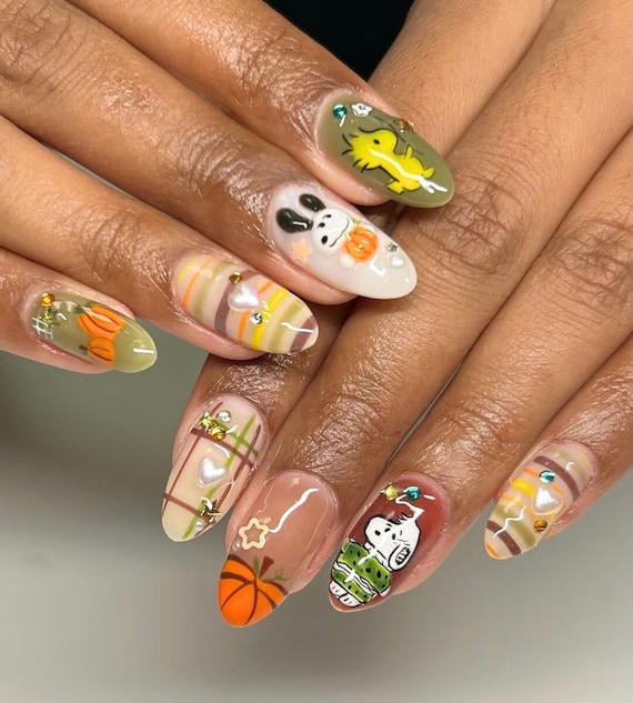 Top 10 Emojis para Decorar Suas Unhas